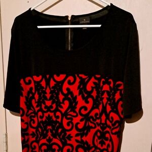 Women's variety pack blouses and one making dress size large all items included.